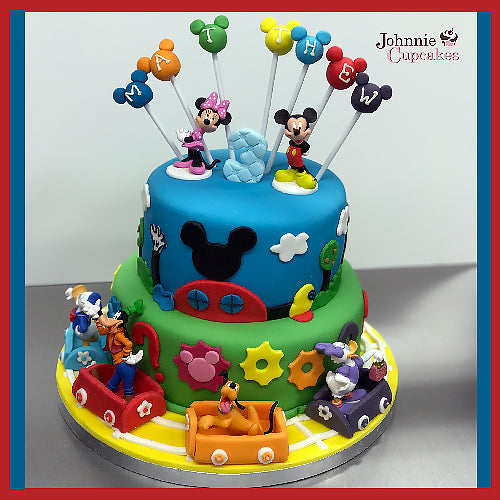 Disney 2 tier cake - Johnnie Cupcakes
